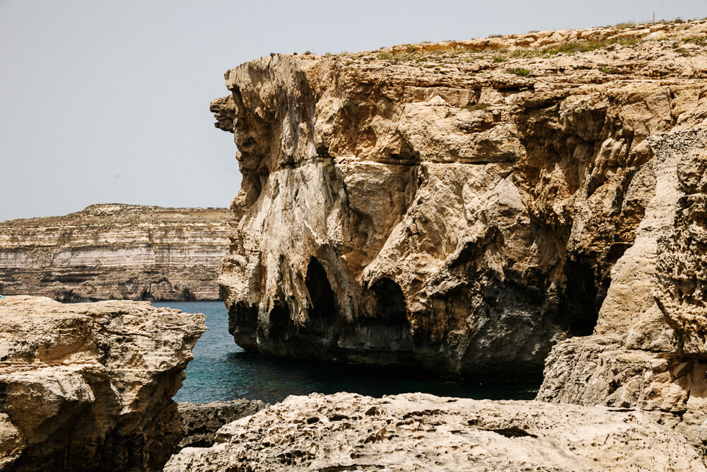 Dwejra is among the best things to do on Gozo island, because of the great snorkeling and diving opportunities in the Blue Hole, a boat tour in the Inland sea, the fossils that can be observed in the rocks, and the views of Fungus and Crocodile Rock.