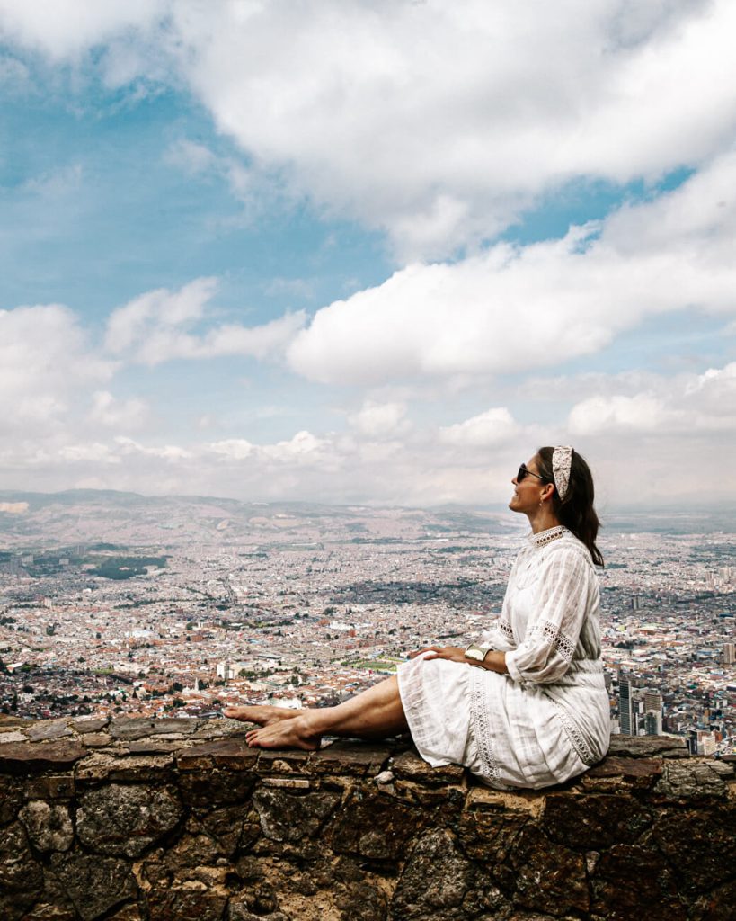 Deborah at viewpoint Monserrate with view of Bogota.