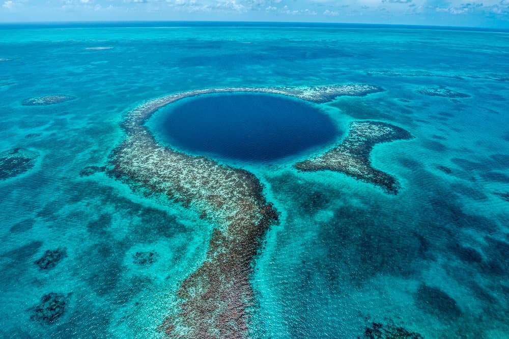 One of the top things to do and a highlight in Caye Caulker Belize is to make a flight over the Great Blue Hole.