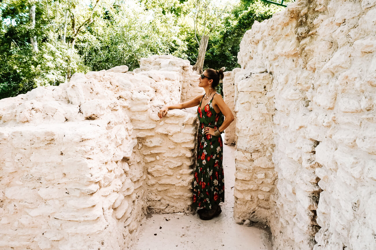 Deborah at restored Maya temple during tour in El Mirador Guatemala