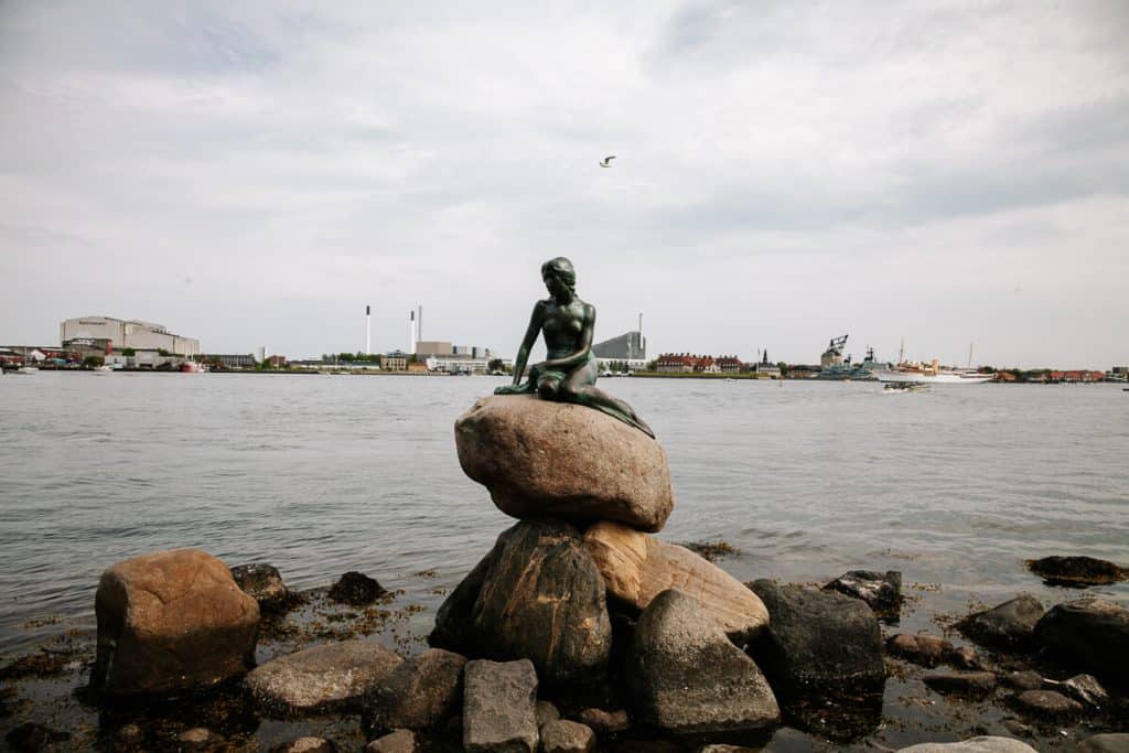 In Copenhagen you will find the famous Den lille Havfrue, the little Mermaid statue, beautifully situated on the water, one of the sights and things to do in Denmark that you should not miss.