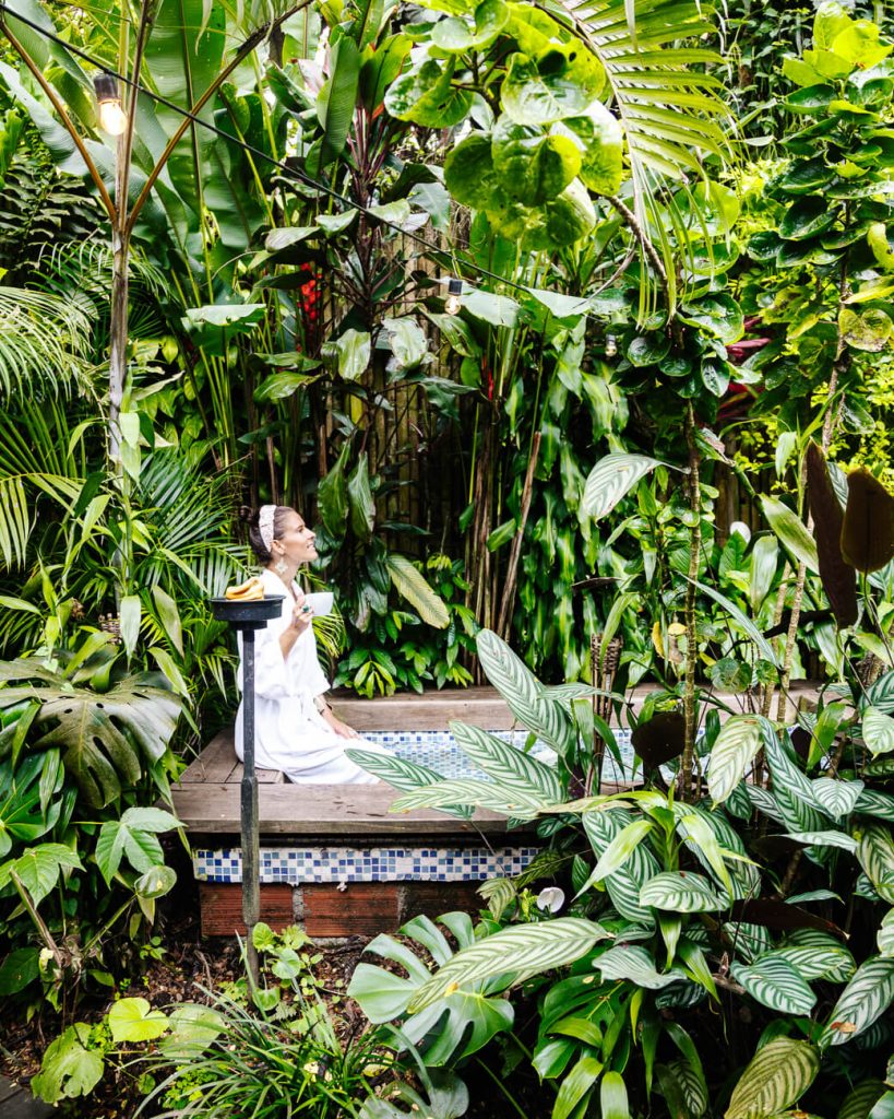 Deborah in jacuzzi of Sazagua Boutique Hotel, one of the best places to stay in the coffee region in Colombia