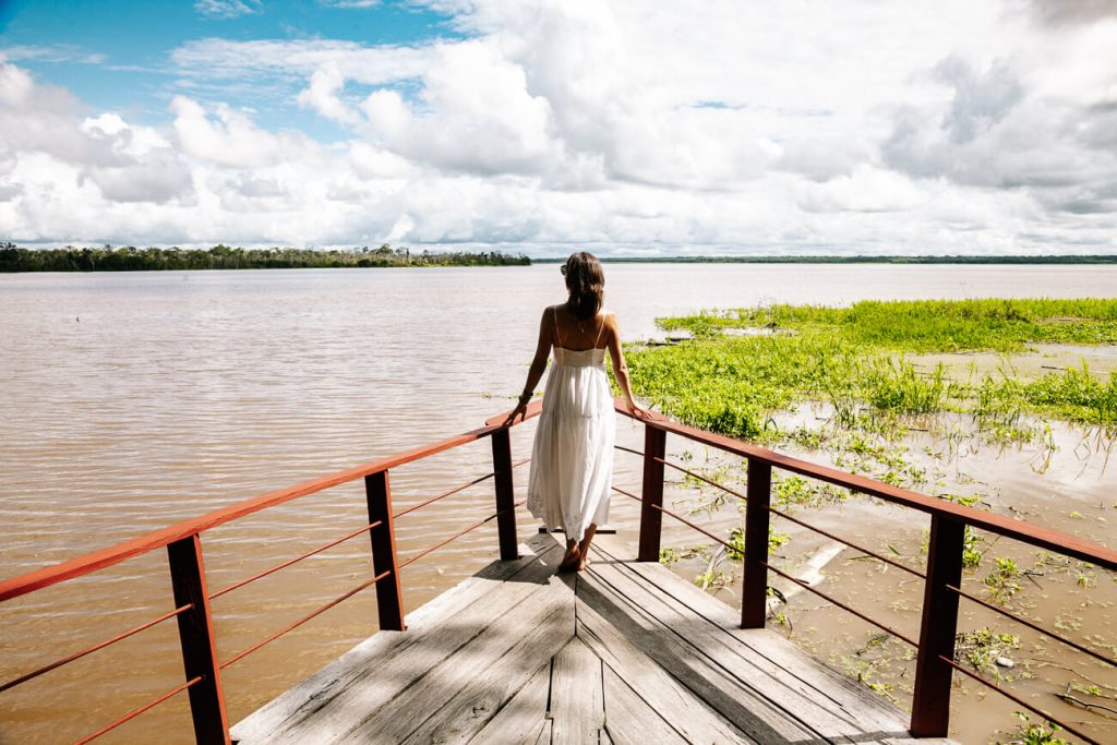 Deborah at jetty of Calanoa Amazonas jungle lodge in the Colombian Amazon