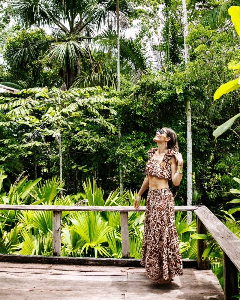 Deborah op balcony Calanoa Amazonas jungle lodge with view of the jungle