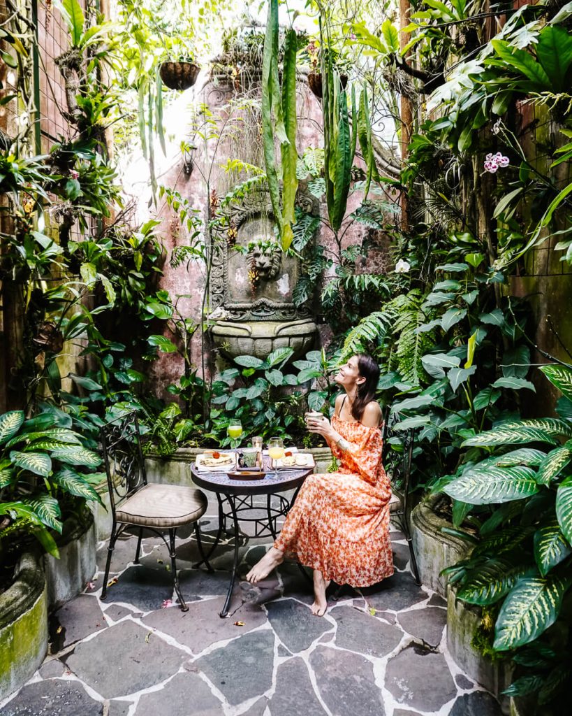 Deborah in orchid garden in Casa Prana lake Atitlan Guatemala