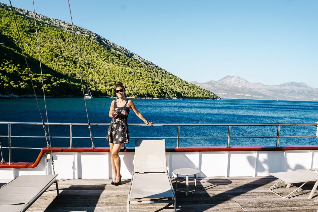 Deborah at cruise, with nice views.