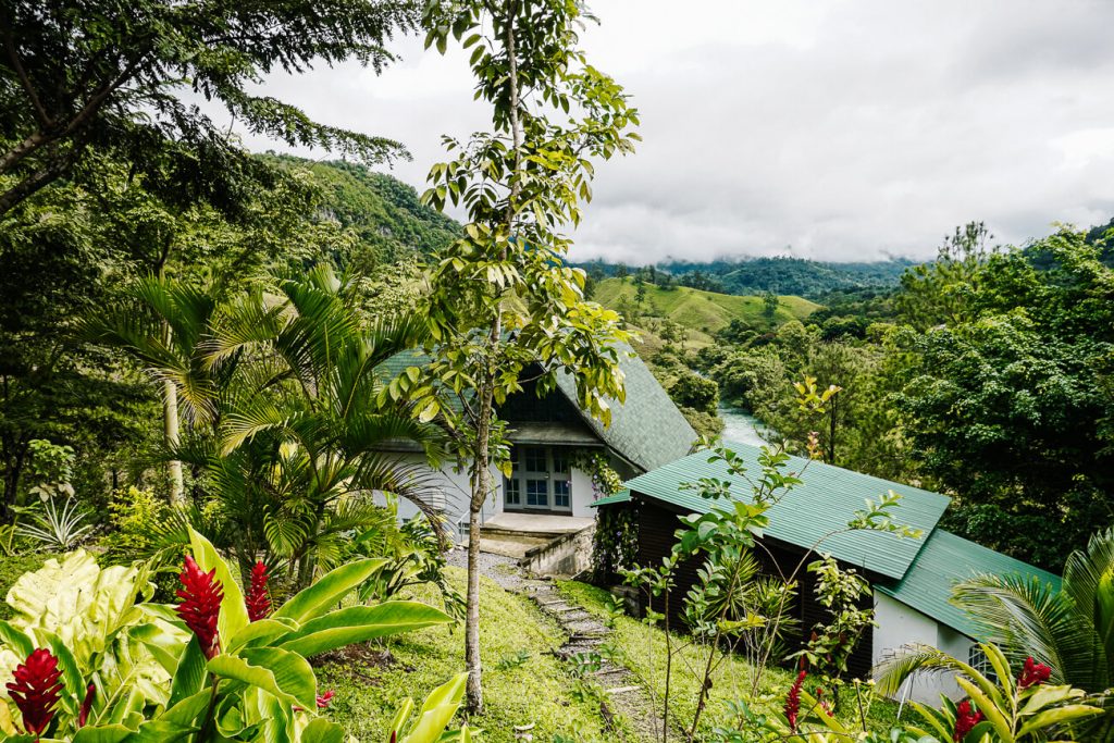 hotel surrounded by greenery in Lanquin