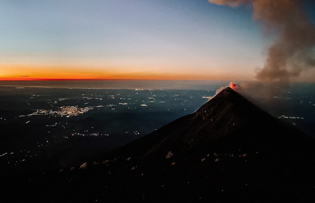 View of erupting Fuego volcano durinng sunset | one of the best things to do in Antigua Guatemala.