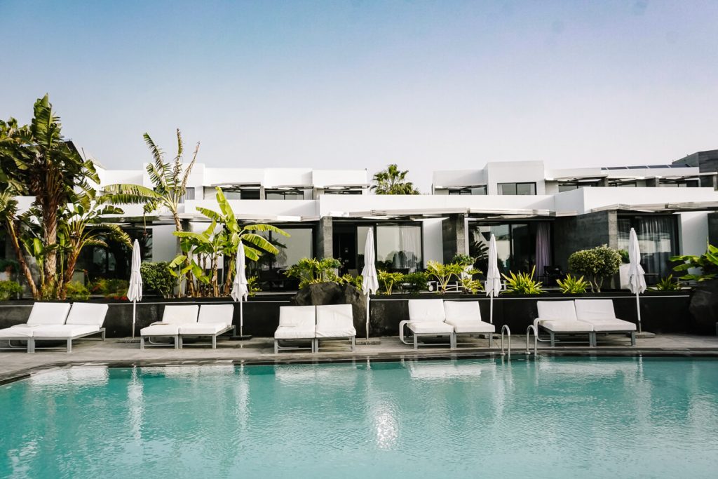 swimming pool with palmtrees Lanzarote