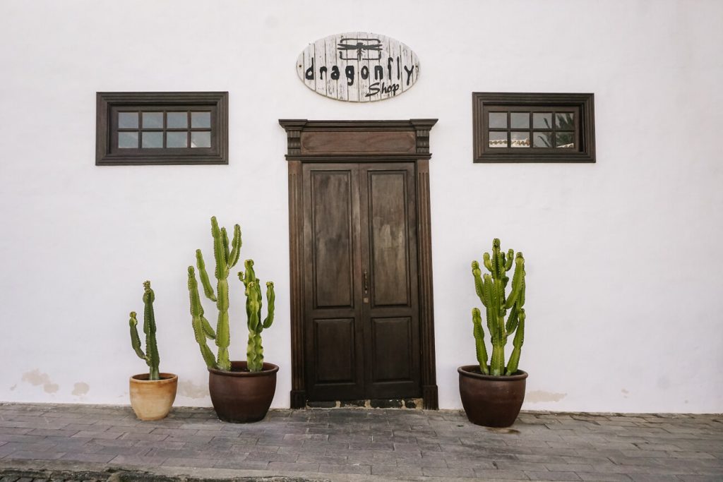 white houses in Teguise. Teguise is the former capital of Lanzarote and one of the oldest towns on the island. One of my Lanzarote travel tips is to visit Teguise on a saturday because of the market. 