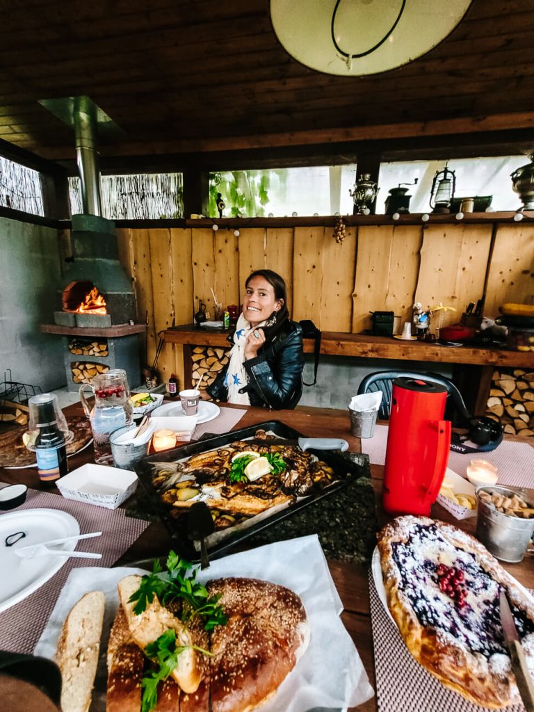 deborah during fis dinner - In Peipsi Fish shop – Kallaste, you can enjoy the best smoked fish