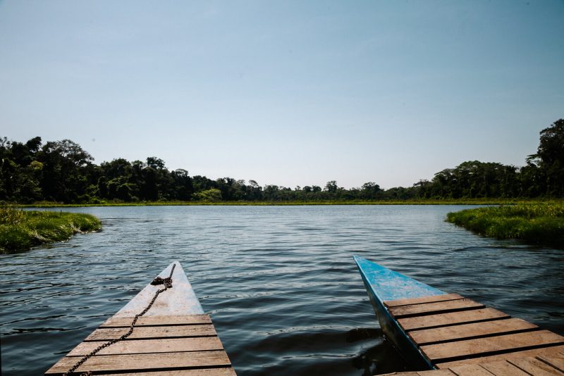 Oxbow lake in Tabopata Peru can be visited by catamatan, two wooden boats with a deck, chairs and benches. In order to not to disturb and pollute nature, there is no engine and the skipper manually uses all his forces to transport you.