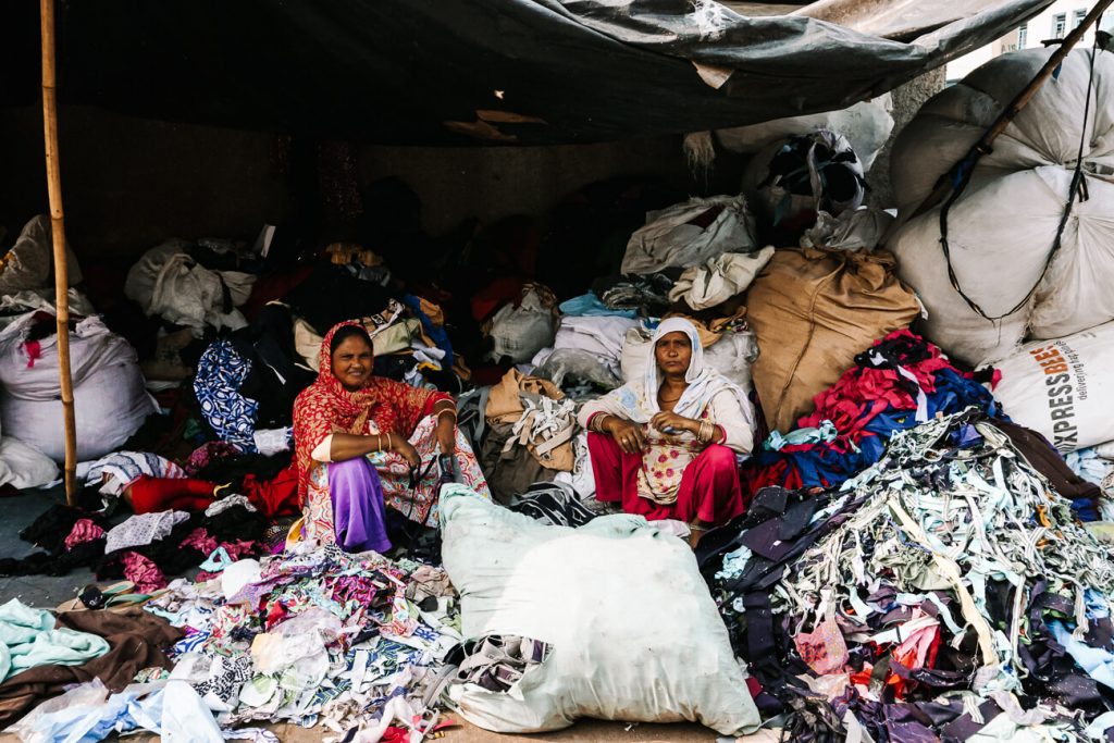 women in recycling street