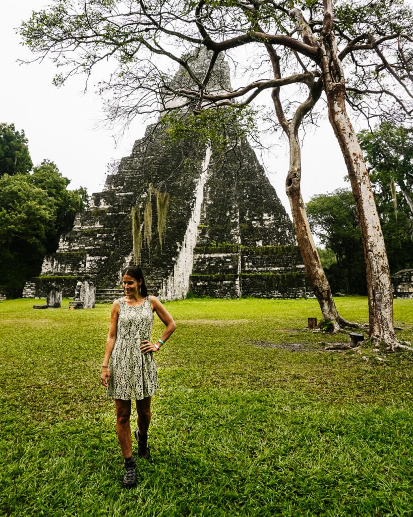 woman in front of pyramid in tikal National Park | a day trip to tikal