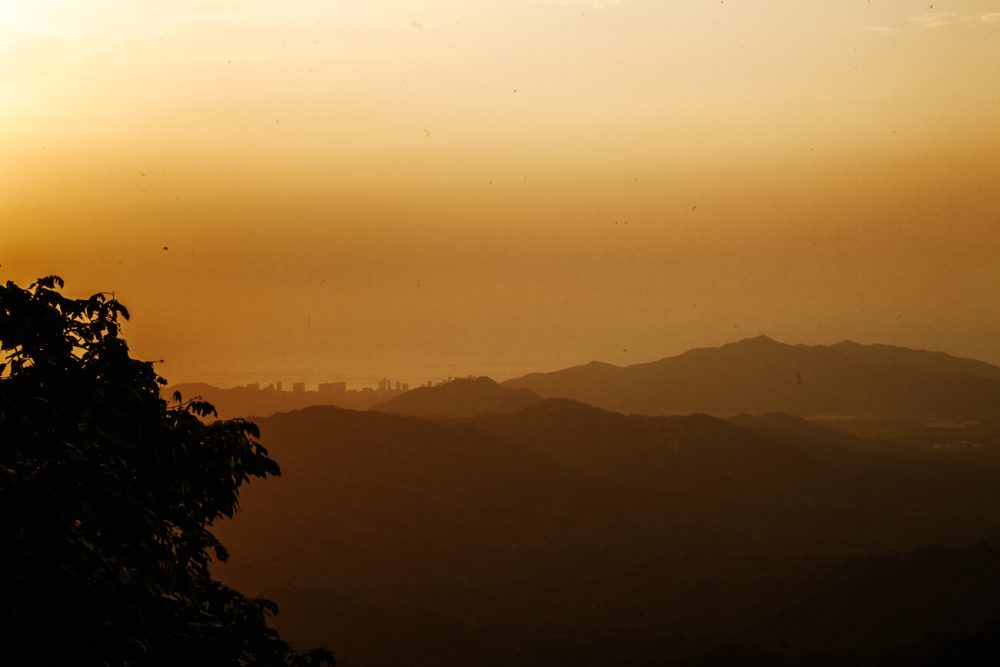 view of Santa Marta and coast with beautiful sunset from Minca in Colombia