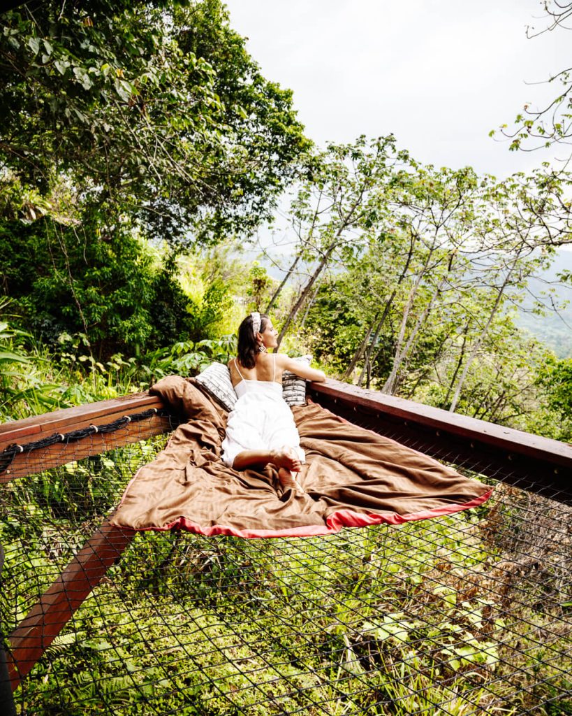 Deborah in hammock a Trekker Glamping, a unique hotel to be found in my Minca Colombia travel guide.