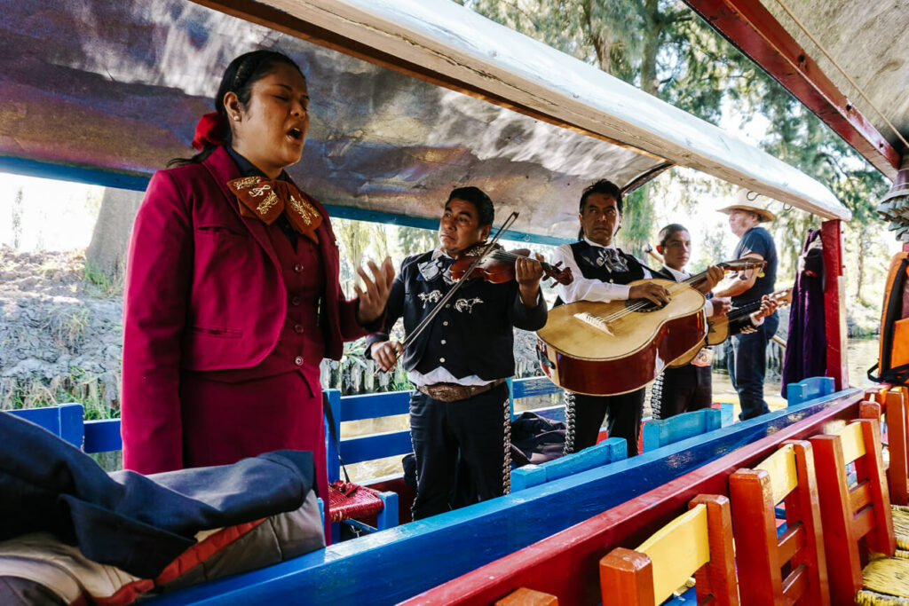 Mariachi bands, who sing the typical mariachi songs. 