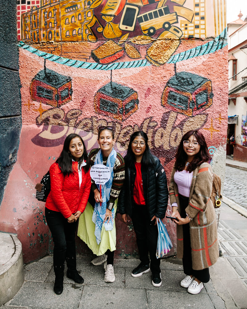 The street to the left of the San Francisco Cathedral in La Paz Bolivia is called Calle Sagarnaga, with shops, travel agencies and small eateries on the left and right.