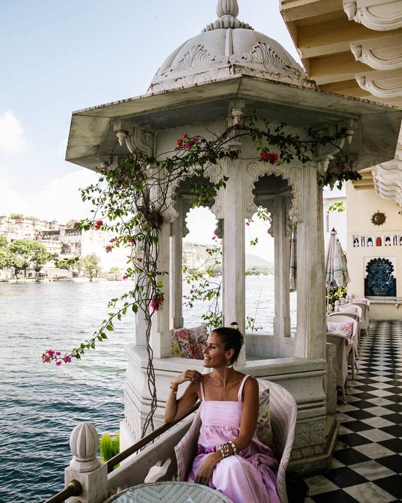 Deborah on the terrace of the Lake Pichola Hotel, one of the best things to do in Udaipur India.