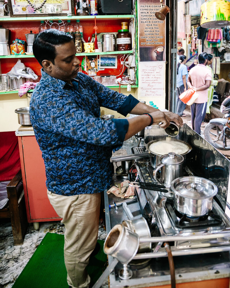 A cup of chai conists of black tea, milk, water and spices such as cardamom, cinnamon, anise, pepper, cloves and nutmeg.