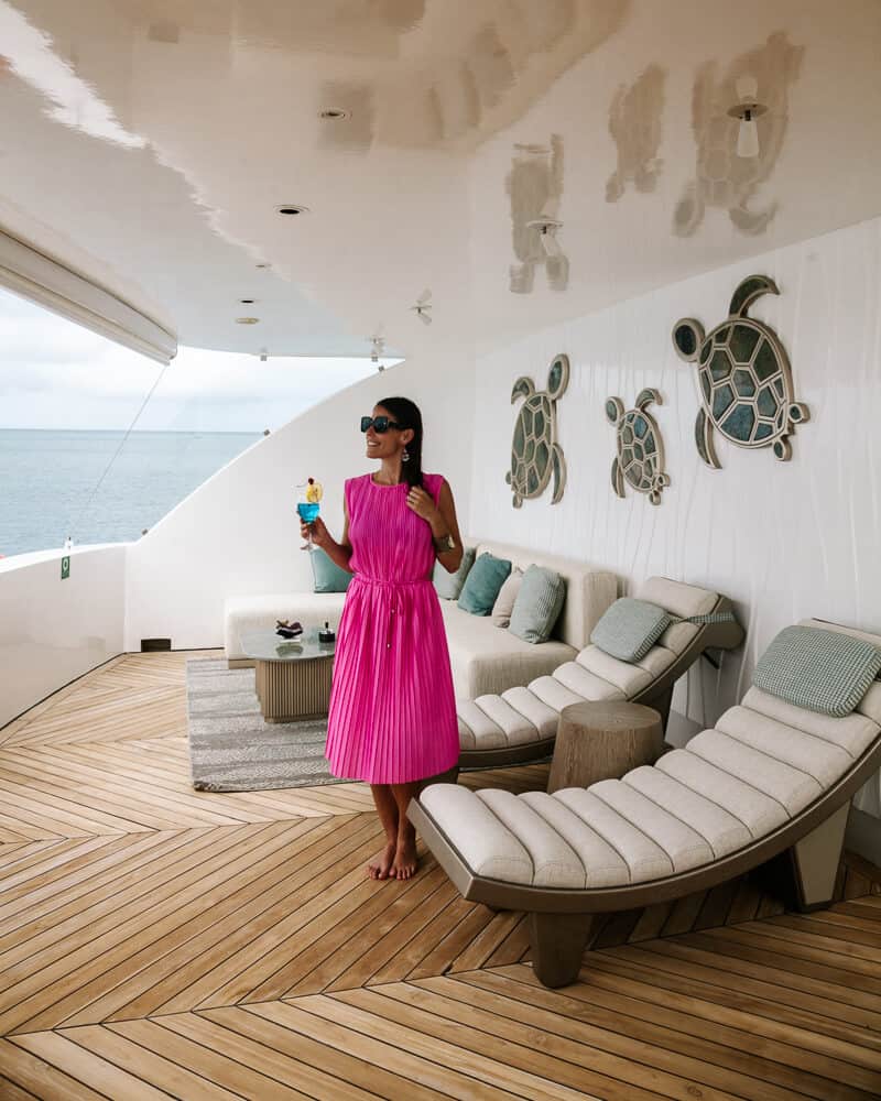 Deborah on deck of the Golden Galapagos Islands Elite 4 day cruise in Ecuador. 