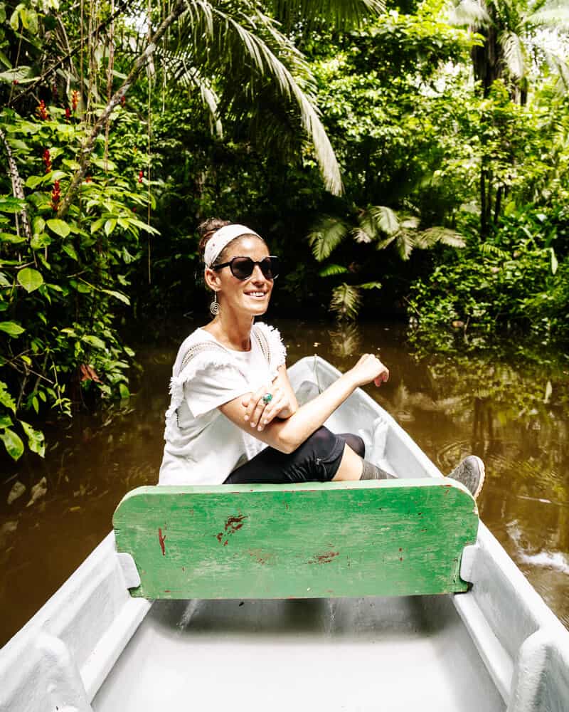 Deborah on boat in Amazon Ecuador.